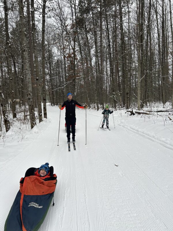 Kids in Pulk Cross Country Ski Headquarters