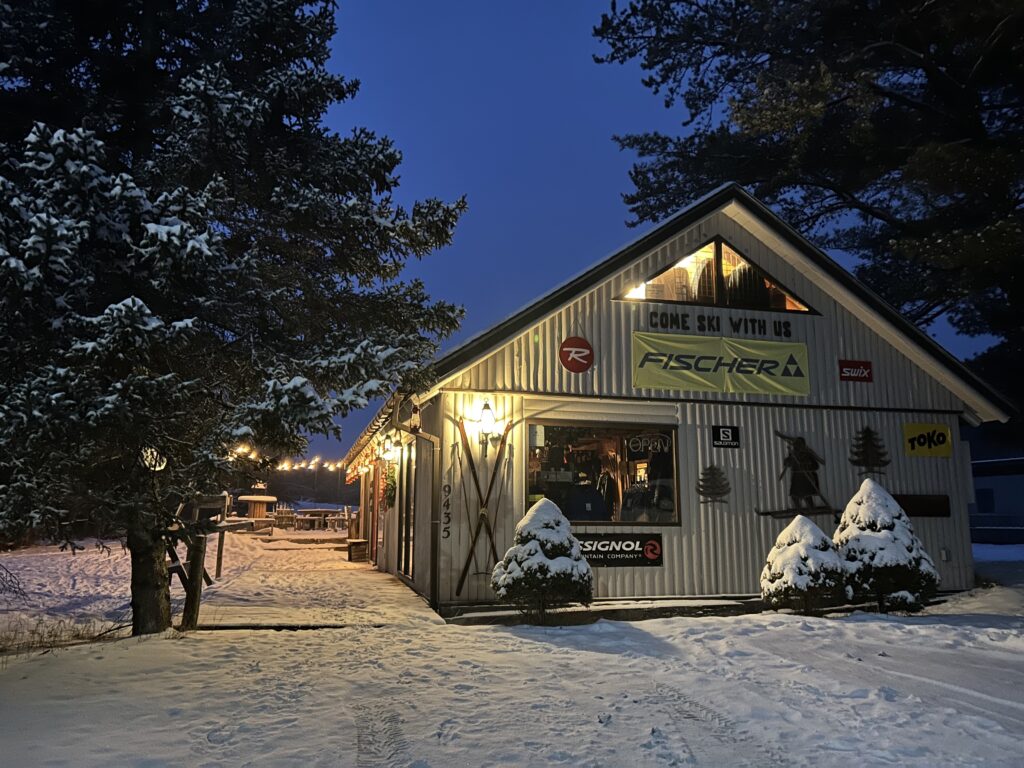 Snowy XC SKI HQ Store Front at Night