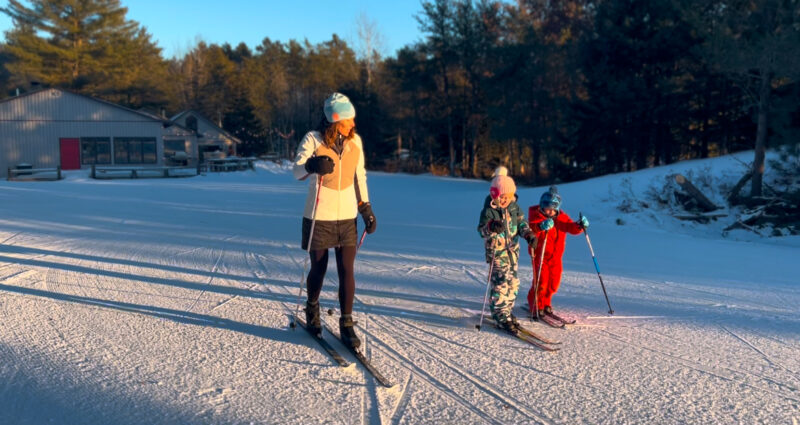 Kids and Mom Skiing at Golden Hour Sunset cross Country Ski Headquarters